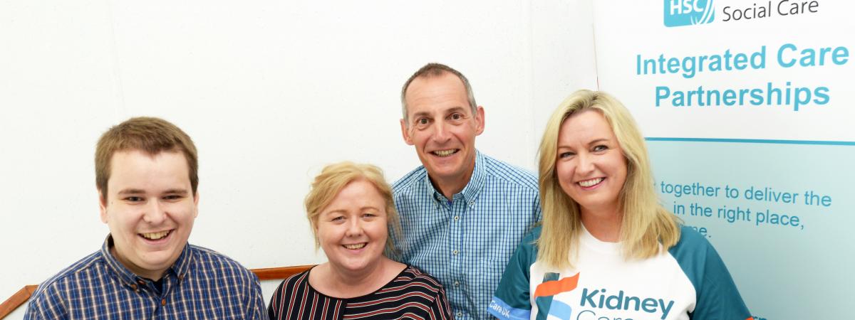 Organ donation champion Jo-Anne Dobson and her son, Mark, who underwent a recent kidney transplant, promote a new 'sick day' card to help people keep their kidneys healthy. Included with them are Dr John Harty, from Southern Trust's renal unit and Michele Bekmez, Southern area Integrated Care Partnership.