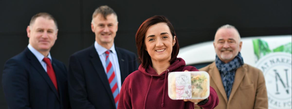 William McCulla, Invest Northern Ireland’s Director of Corporate Finance (centre); Harry McDaid, CEO, UCIT (right) and Donal Leahy, Senior Lending Executive, Enterprise Northern Ireland (left) with Caoimhe O’Kane, Founder of Eat Naked NI.