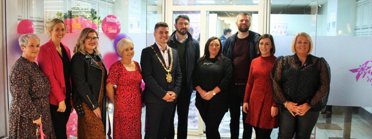 Belfast Lord Mayor, local politicians, and Pretty ‘n’ Pink Breast Cancer Charity staff and volunteers at the launch of the new Breast Cancer Information & Support Hub at The Park Centre in Belfast