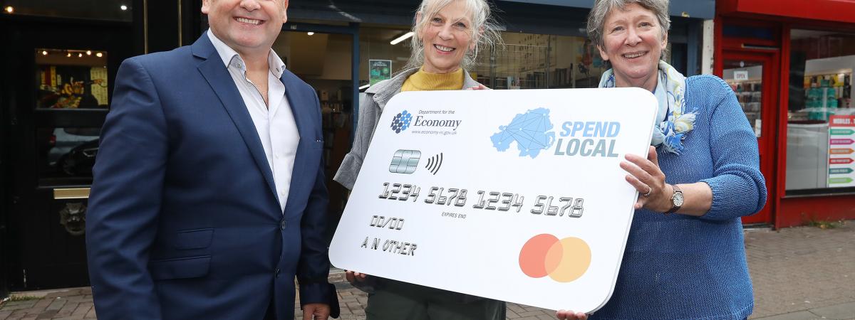 Denny Elliott, Head of Self Help Africa Northern Ireland, is pictured with Self Help Africa Northern Ireland volunteers Jane Thompson and Maggie Crawford who are excited to welcome the Spend Local pre-paid cards in the Botanic Avenue store. https://selfhelpafrica.org/ie/donate/