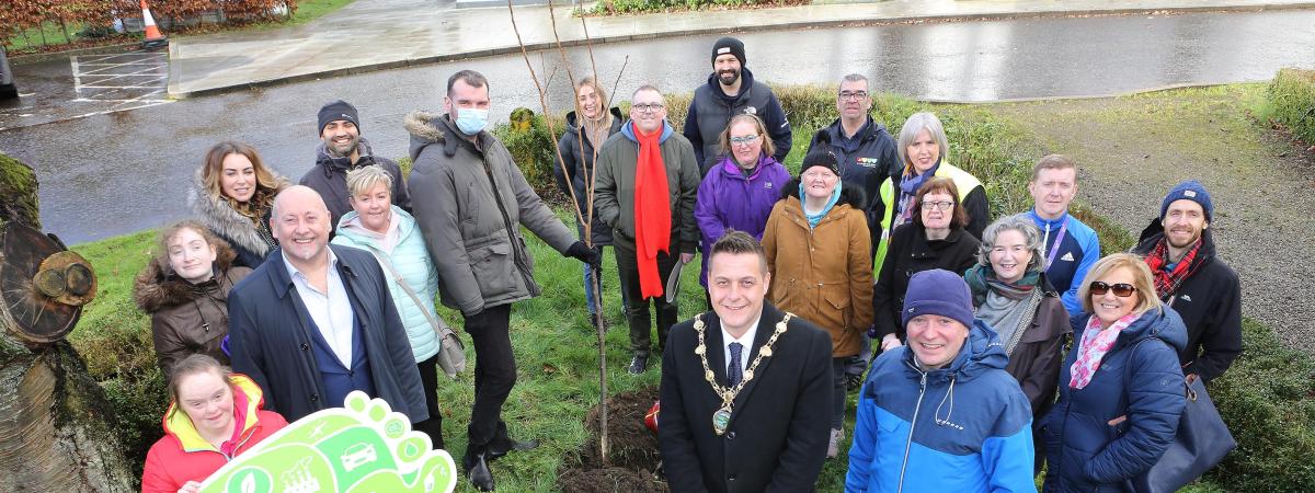 Self Help Africa Northern Ireland Carbon Offsetting Initiative: Mayor of Derry City and Strabane District Council, Alderman Graham Warke, is pictured at St Columb’s Park, with Denny Elliott, Head of Self Help Africa Northern Ireland, and Paul Armstrong of Foods Connected, together with friends from Praxis Care, at the planting of the first tree as the charity’s carbon offsetting initiative with businesses across Northern Ireland takes root. https://selfhelpafrica.org/onemilliontrees/carbon-offset/