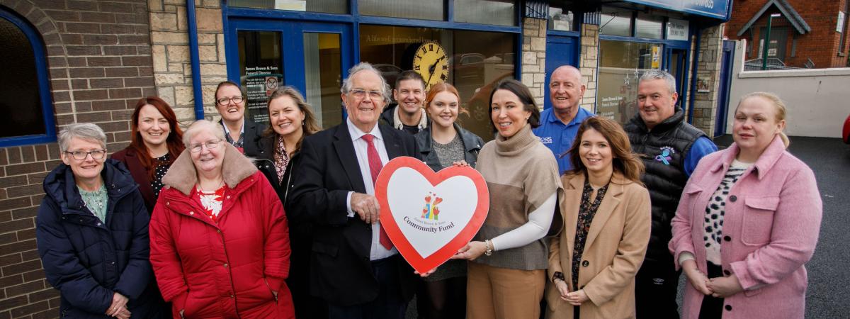 James Brown MBE and Beverley Brown, James Brown & Sons, are pictured with recipients of the James Brown & Sons Community Fund. www.jamesbrownfuneraldirectors.com