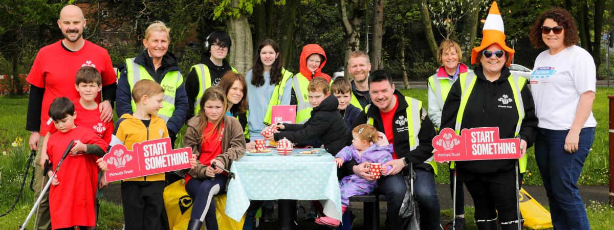 Grainne McCloskey, Scotland and Northern Ireland Regional Manager, Eden Project Communities, is joined at the first Coronation Big Lunch by Prince's Trust Andy Briggs and family, junior parkrun volunteer Barbara Zboralska and family, Prince's Trust Enterprise Manager Jonny McKim and his daughter, junior parkrun volunteers Mark Cunningham and Anne Magee, and Prince's Trust and junior parkrun volunteer Karolyn Gaston and family. www.thebiglunch.com