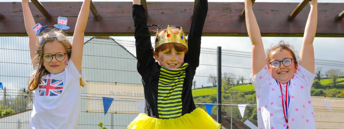 Lily Swann and friends enjoying the Coronation Big Lunch in Glynn