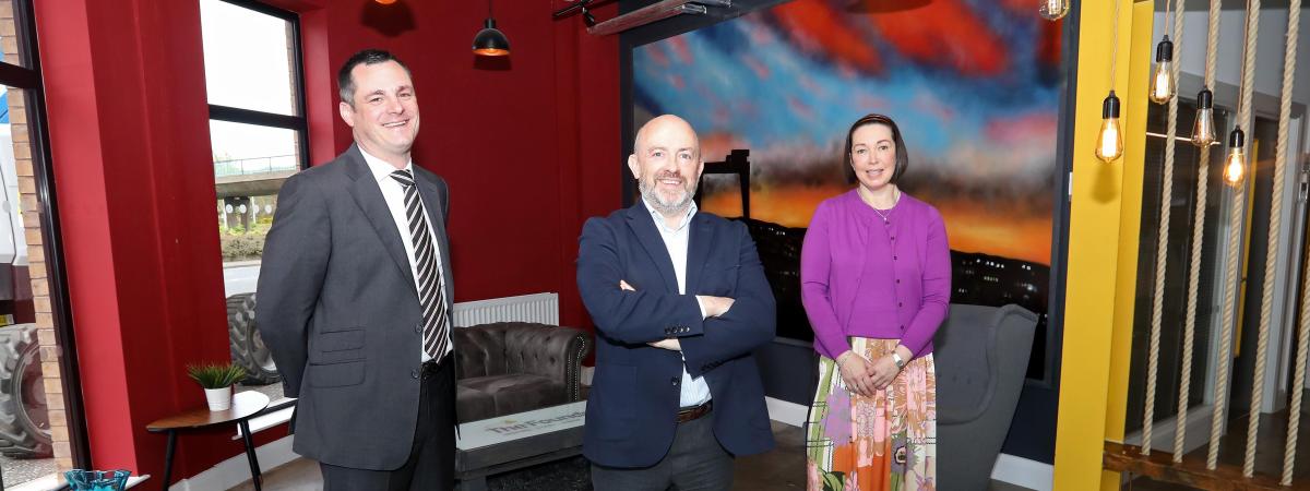 Jonathan McAlpin, Chief Executive of East Belfast Enterprise, is pictured with new board members Gareth Robinson and Beverley Brown. www.eastbelfast.org