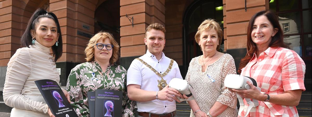 From left Professor Deepa Mann-Kler (CEO, Neon & Ulster University professor), Linda Campbell (chair, Hope 4 ME & Fibro), Lord Mayor Councillor Ryan Murphy, Joan McParland MBE (Hope 4 ME & Fibro founder) and Julie Reid (deputy head of services, Libraries NI)