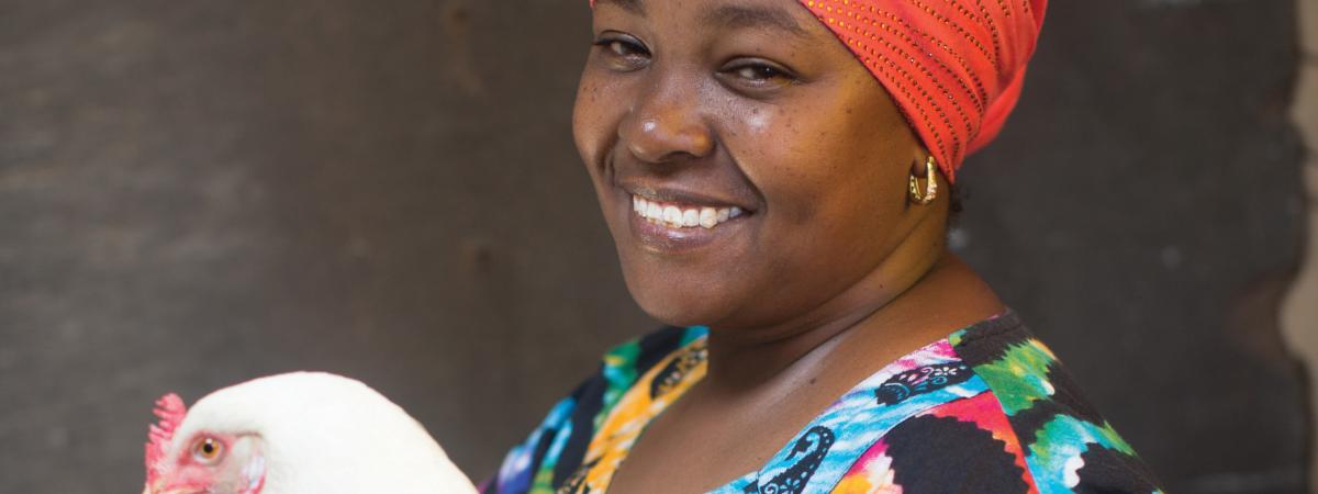 Khadija Kuroi from Machanga, Kenya, took part in a Self Help Africa programme - receiving improved breed birds to begin poultry breeding.