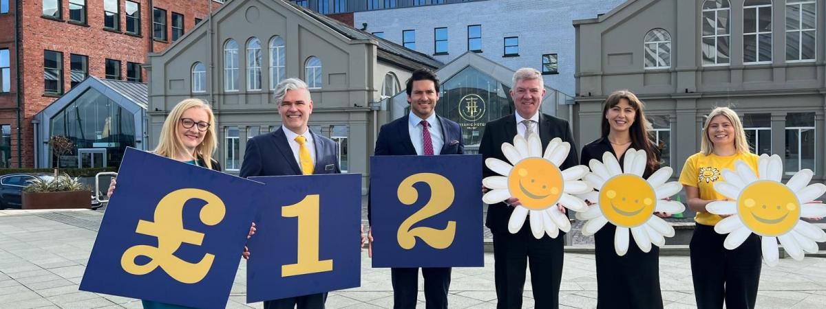 The team from Titanic Hotel Belfast celebrate funds raised for chosen charity Cancer Fund for Children