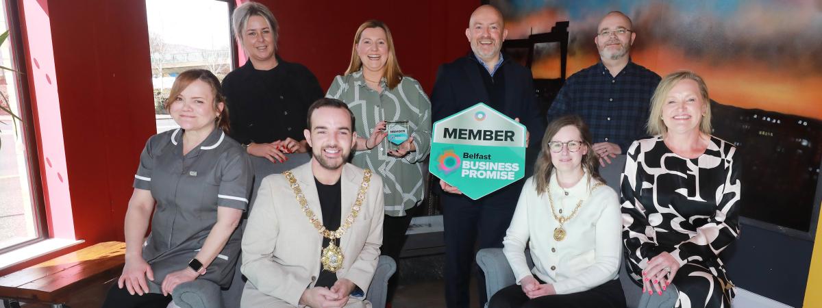 Lord Mayor of Belfast Councillor Micky Murray and High Sheriff Councillor Fiona McAteer congratulate Jonathan McAlpin and the team at East Belfast Enterprise on becoming the first enterprise agency to be awarded Belfast Business Promise Member status.