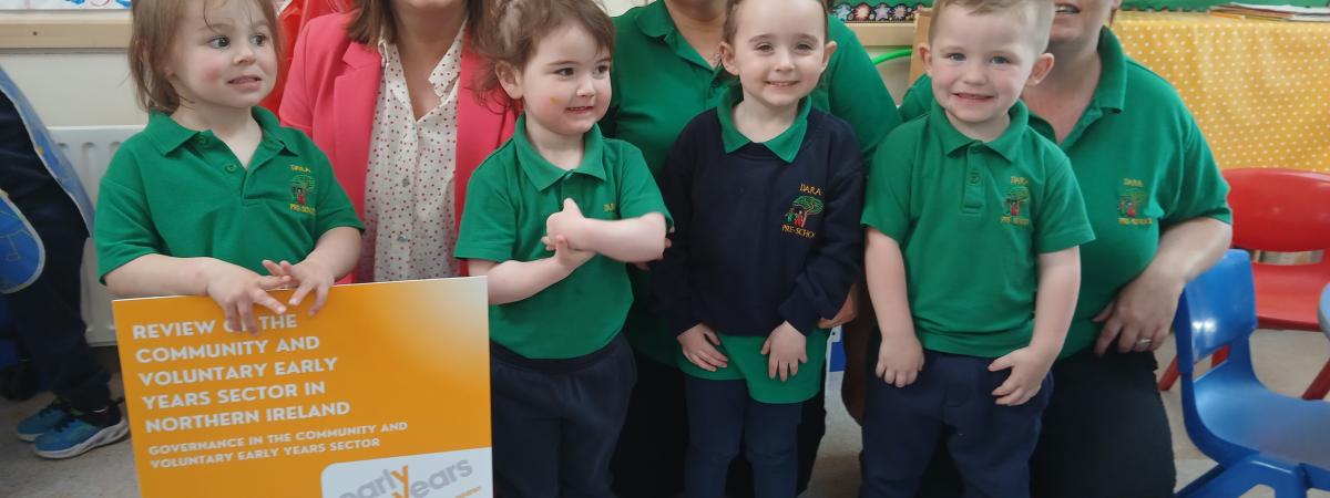 PHOTO CAPTION Audrey Rainey, Chief Operating Officer, Early Years, is pictured with staff and children at Dara Pre-School in Armagh.