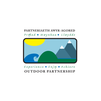 A rectangular picture with the sun in the top left corner, blue sky, a wave on the bottom left corner, a green hill in the middle and two snowcapped mountains to the right. The words experience, enjoy, achieve are written above in Welsh and below in English along with the company name, The Outdoor Partnership.
