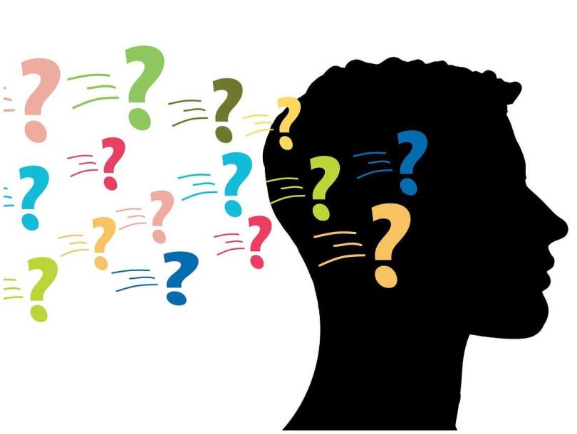 Black-out graphic of side profile of man, with colourful question marks coming from his head.