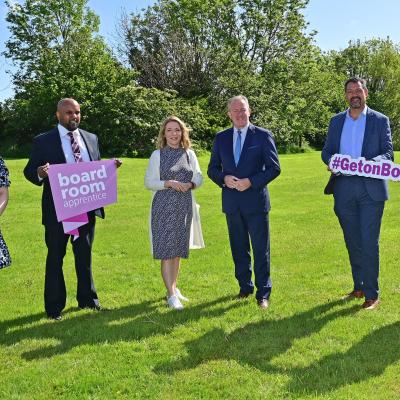 Boardroom Apprentices May Cheung (2019), Nikita Brijpaul (2020), Jo McGinley (2020) Minister of Finance Conor Murphy MLA, David Johnston (2021) and Roisin Kelly (2019) encouraging people to #GetOnBoard by applying for the Boardroom Apprentice programme before applications close on May 24th.  Photo by Colm Lenaghan at Pacemaker Press.