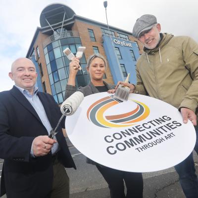 Jonathan McAlpin and Lauren Shaw of East Belfast Enterprise are joined by artist Dee Craig of Belfast Mural Arts, to launch the Connecting Communities Through Art project bringing together the local community to create murals for City East, at the gateway to East Belfast. 