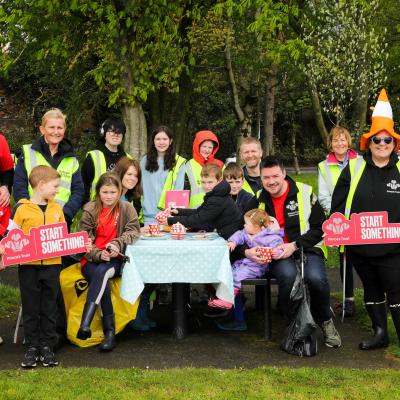 Grainne McCloskey, Scotland and Northern Ireland Regional Manager, Eden Project Communities, is joined at the first Coronation Big Lunch by Prince's Trust Andy Briggs and family, junior parkrun volunteer Barbara Zboralska and family, Prince's Trust Enterprise Manager Jonny McKim and his daughter, junior parkrun volunteers Mark Cunningham and Anne Magee, and Prince's Trust and junior parkrun volunteer Karolyn Gaston and family. www.thebiglunch.com