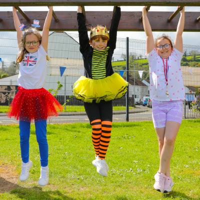 Lily Swann and friends enjoying the Coronation Big Lunch in Glynn