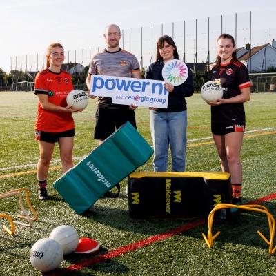 Pictured (L-R) with some of the training equipment that was bought thanks to the £300 Helping Hands donation is St Joseph’s Glenavy GAC Senior Ladies’ player Mary McStravick, Team Manager Chris Scullion, Power NI representative Lauren Donnelly, and club player Grainne McLaughlin.