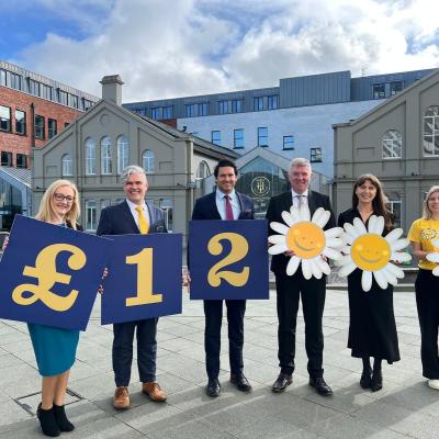 The team from Titanic Hotel Belfast celebrate funds raised for chosen charity Cancer Fund for Children