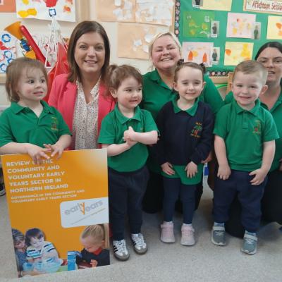 PHOTO CAPTION  Audrey Rainey, Chief Operating Officer, Early Years, is pictured with staff and children at Dara Pre-School in Armagh.