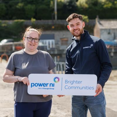 Shona Collins, charity secretary at Newcastle Harbour Heritage Association, pictured with Power NI representative Barry Rogan.